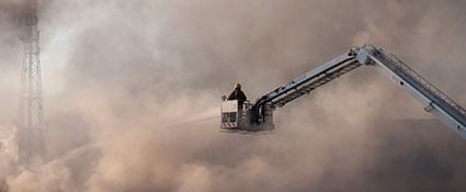 Firefighter on Ladder Truck fire-basket